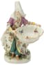 MEISSEN SWEETMEAT FIGURE OF A TURK, 20TH CENTURY
Woman wearing Turkish dress seated holding an open shell basket
modelled by J. F. Eberlein, circa 1755