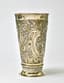 SILVER-GILT BEAKER DECORATED WITH A FLORAL ORNAMENT WITH THE ARCHITECTURAL ELEMENTS 
