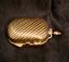 18K GOLD LADY'S MIRROR AND PERFUME FLASK
