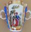 DOUBLE HANDLED PORCELAIN CUP AND SAUCER, 19th century