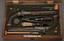 A pair of duelling pistols by Nicolas - Noel Bute, gunsmith of the emperor of France, in its original case with accessor...