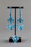 BLUE TOPAZ AND 18K WHITE GOLD GIRANDOLE EARRINGS AND RING