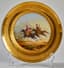 GARDNER PORCELAIN MILITARY PLATE 'IRREGULAR CAVALRY'
decorated with a battle scene between a Kuban Tatar and a Kalmyk, gilt foliate border
Gardner Manufactory, Verbilki, circa 1810-1820
