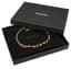 CHANEL
Burgundy beads and gold metal necklace with CC logo, Fall 2023