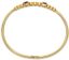 BRACELET JONC ARTICULÉ EN OR JAUNE 18K, DIAMANTS ET RUBIS