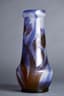 ART NOUVEAU 'GALLÉ' VASE IN BLUE AND BROWN
CAMEO GLASS WITH IRIS DECORATION, CIRCA 1900