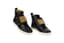HERMÈS
Black calfskin studded sneakers