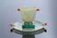 ART DECO ROUND JADE, GOLD, CABOCHON
EMERALD AND CORAL SAUCER AND ONE
MALACHITE MARQUETRY JADE, CORAL,
GOLD AND CABOCHON ONYX CUP.
