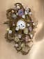LOUIS XV STYLE CARTEL CLOCK DECORATED WITH PORCELAIN FLOWERS