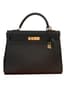 HERMÈS KELLY 32 RETOURNE
Black grained leather, 2001