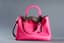 CHRISTIAN DIOR
Fuchsia Ostrich Leather ‘diorissimo’ Handbag