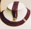 FACETED RUBY, DIAMONDS AND 18K GOLD NECKLACE AND BRACELET