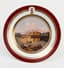A PORCELAIN PLATE WITH A HAND PAINTED VIEW OF THE KAMENNOSTROVSKY ISLAND PALACE, AFTER THE PAINTING BY SEMYON SCHEDRIN, WITHIN GILT BORDERS, THE RIM WITH A RED OUTER BAND BETWEEN GILT BORDERS, MONOGRAM S AND CROWN ON TOP