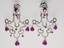 Pair of earrings
Girandole shaped earrings. Set with ruby and diamond