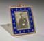 EXCEPTIONALLY FINE BELLE EPOQUE BLUE GUILLOCHÉ ENAMEL AND 14K GOLD PHOTOGRAPH FRAME
The House of Fabergé, Supplier to the Court of His Imperial Majesty, Workmaster Michael Perchin, Russia, end of XIX century.
