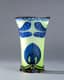 BOHEMIAN ART NOUVEAU VASE IN YELLOW AND
BLUE GLASS DECORATED WITH DRAGONFLIES,
FLOWERS AND STONES
