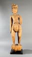 IMPORTANT WOOD FIGURE OF TURBANED MAN IN A DHOTTI 
BURMA, 18TH - 19TH CENTURIES