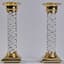 PAIR OF COLONNADE-SHAPED GLASS AND GILDED BRASS CANDLESTICKS
Italy (?), circa 1960