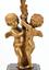 A PAIR OF GILT-BRONZE PUTTI CANDLE HOLDERS, 19th century