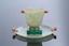 ART DECO ROUND JADE, GOLD, CABOCHON EMERALD AND CORAL SAUCER AND ONE MALACHITE MARQUETRY JADE, CORAL, GOLD AND CABOCHON ONYX CUP, CIRCA 1925