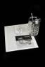 Bar item
Cut-crystal Martini mixer with silver top. Silver stirrer. Together with a page of advertisement
