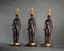 SET OF THREE EMPIRE STYLE GILT BRONZE AND PATINATED CANDLESTICKS
Paris, vers 1860