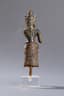 STATUETTE OF A GODDESS WEARING A ‘SARONG’ WITH AN APRON-LIKE FOLD AND A CONICAL HEADDRESS
CAMBODIA, ANGKORIAN PERIOD, ANGKOR WAT, 12TH CENTURY