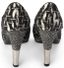CHANEL
Escarpins en tweed