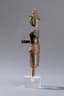 STATUETTE OF A GODDESS WEARING A ‘SARONG’ WITH AN APRON-LIKE FOLD AND A CONICAL HEADDRESS
CAMBODIA, ANGKORIAN PERIOD, ANGKOR WAT, 12TH CENTURY