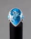 BLUE TOPAZ AND 18K WHITE GOLD GIRANDOLE EARRINGS AND RING