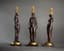 SET OF THREE EMPIRE STYLE GILT BRONZE AND PATINATED CANDLESTICKS
Paris, vers 1860