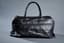 CHANEL
Black quilted caviar leather weekend travel bag
