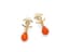 Chanel
Drop earrings with orange beads and a gold-tone CC logo Fall 2023