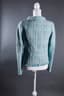 CHANEL
Blue tweed jacket with sequins
