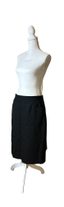 CHANEL
Black wool skirt