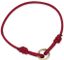 CARTIER
BRACELET CORDON EN CUIR ROUGE ET PENDENTIF ‘TRINITY’ EN OR 18K