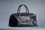 CHANEL
Black quilted caviar leather weekend travel bag