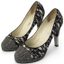 CHANEL
Escarpins en tweed