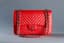 CHANEL RED CAVIAR LEATHER CLASSIC FLAP BAG
Red caviar-grained leather bag with double flap, CC logo clasp and double handle