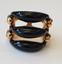 (Δ) GOLD, DIAMOND, AND ONYX RING