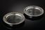 A PAIR OR CARTIER SILVER AND GLASS COASTERS, CIRCA 1950S