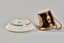 [LOUIS-ALEXANDRE BERTHIER (1753 - 1815)]
PORCELAIN JASMIN SHAPED CUP WITH GRISAILLE DECORATION OF A MAN DRIVING A CHARIOT AND SAUCER
Porcelaine de Paris, circa 1800s