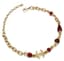 CHANEL
Burgundy beads and gold metal necklace with CC logo, Fall 2023