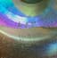 LOUIS COMFORT TIFFANY (1848-1933)
Iridescent stretch glass ruffled bowl with matching plate