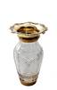 Crystal vase for flowers in a gilded silver frame with floral decor.