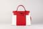 HERMÈS KELLY 35 LIMITED EDITION ‘FLAG OF MONACO’
ROUGE CASAQUE AND WHITE EPSOM LEATHER WITH PALLADIUM HARDWARE CIRCA 2019