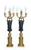 A PAIR OF EMPIRE STYLE GILT AND PATINATED BRONZE
FIGURAL THREE-BRANCH CANDELABRA, FRANCE