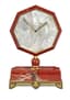 CARTIER PARIS ART DÉCO STYLE TABLE CLOCK
Rare and elegant Art Deco style table clock, in blood jasper, mother-of-pearl, enamel and gilded brass, quartz movement.