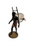 LIQUOR CELLAR 
REPRESENTING A NUBIAN CARRYING ON HIS BACK , AN ENAMELLED GLASS LIQUOR BARREL WITH FOLIAGE DECORATION