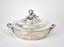 PARCEL-GILT SILVER SOUP BOWL
WITH A COVER DECORATED WITH
A POMEGRANATE FINIAL.
Supplier of the Highest Court I. Sazikov,
Russia, 1864
